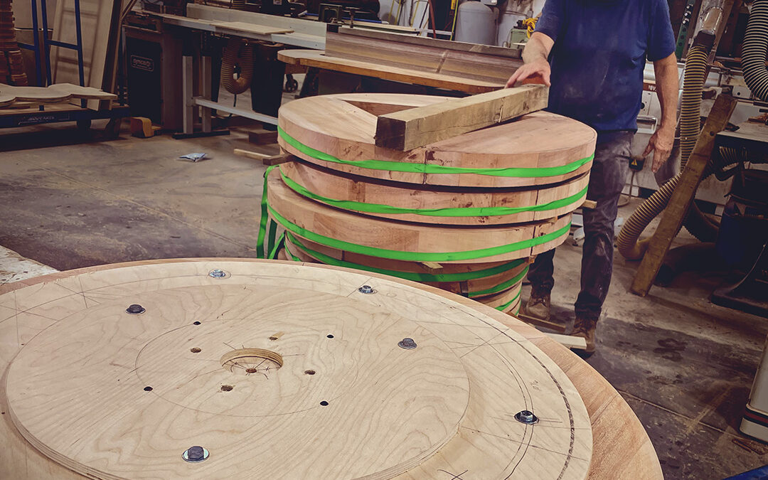 circular architectural wood elements turned on a lathe