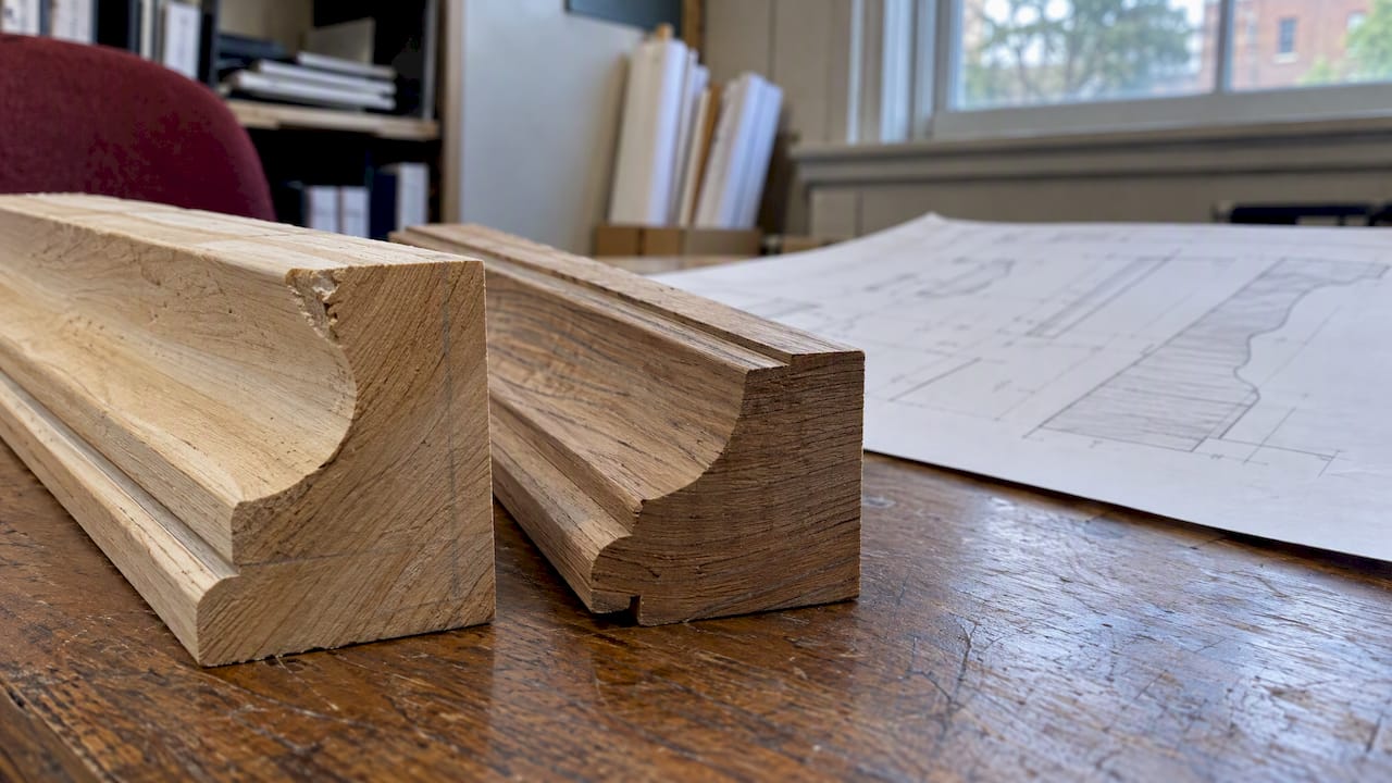 Wood millwork profiles beside a drawing